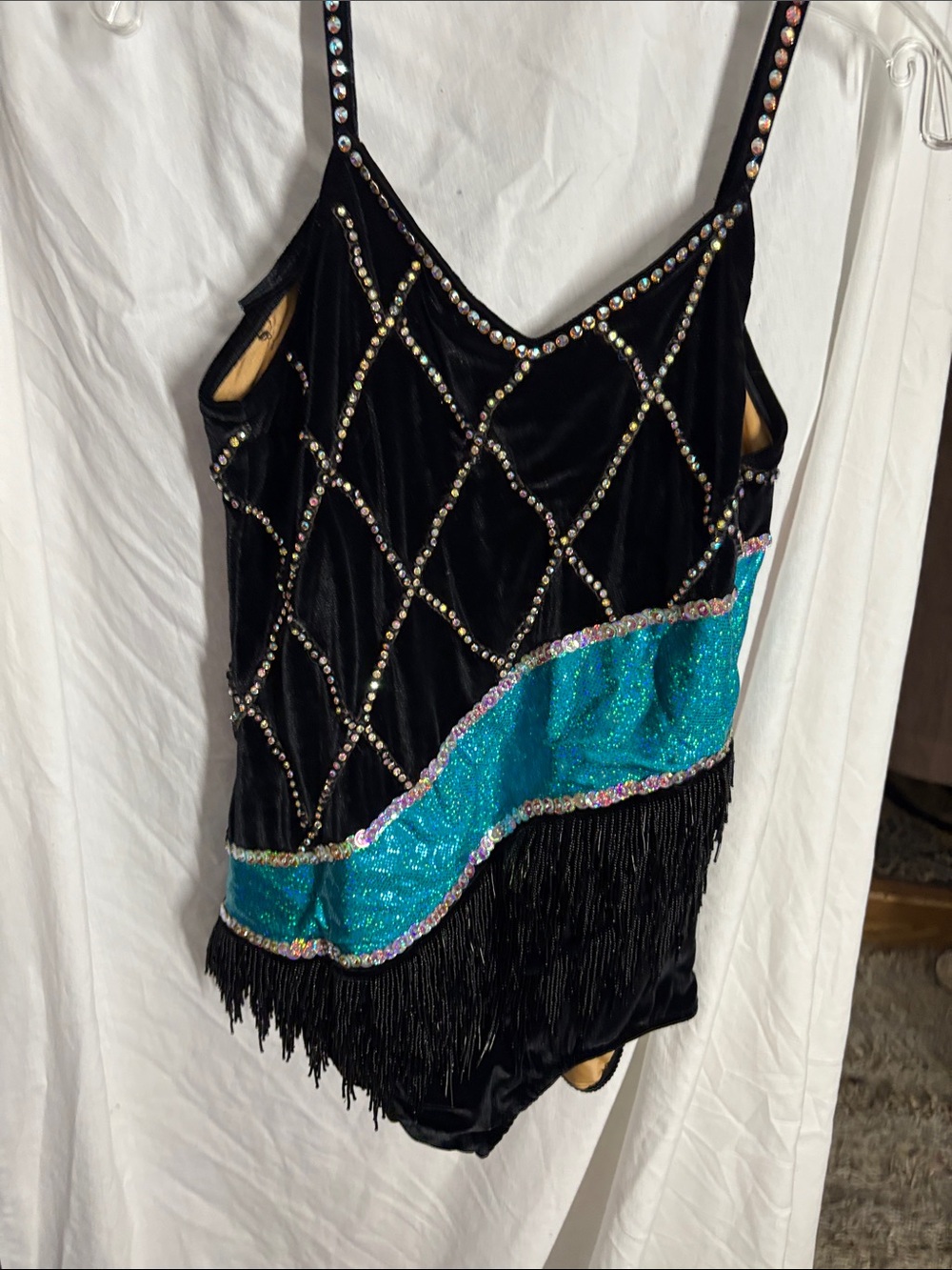 black velvet dance leotard decorated with a rhinestone lattice